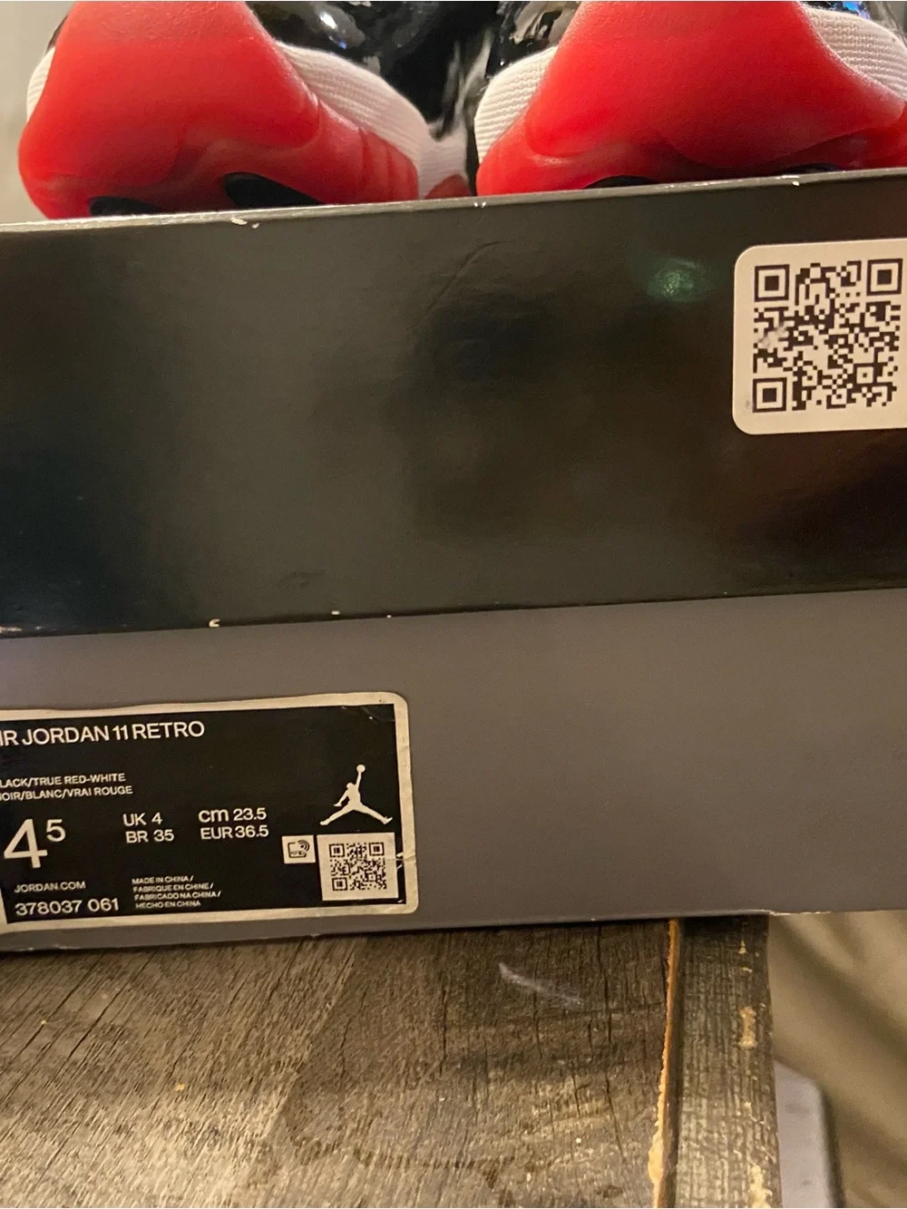 Brand new with tags. Never worn Jordan Black and Red Retro High-Top Sneaker